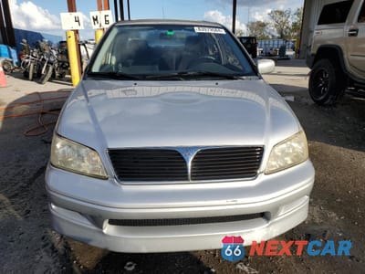 Piąte zdjęcie samochodu w środku: 2003 MITSUBISHI LANCER OZ RALLY VIN:JA3AJ86E43U023179 - miniatura