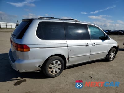 Trzecie zdjęcie samochodu z tyłu: 2002 HONDA ODYSSEY EXL VIN:5FNRL18042B056553 - miniatura