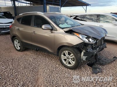 Czwarte zdjęcie samochodu z boku: 2010 HYUNDAI TUCSON GLS VIN:KM8JU3AC5AU092652 - miniatura