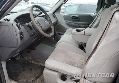 Zdjęcie 7 z 14 samochodu: 2003 FORD F150 VIN:2FTRX18W03CA55434 - miniatura