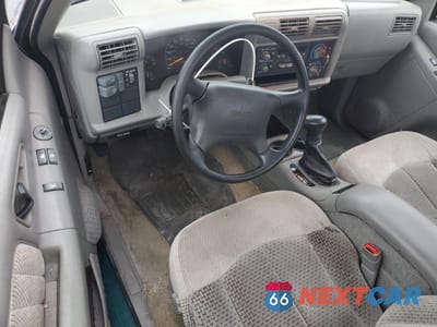 Zdjęcie 8 z 13 samochodu: 1997 GMC SONOMA VIN:1GTCS19X9V8516928 - miniatura