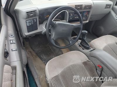 Zdjęcie 8 z 13 samochodu: 1997 GMC SONOMA VIN:1GTCS19X9V8516928 - miniatura