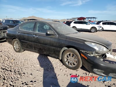 Czwarte zdjęcie samochodu z boku: 2002 LEXUS ES 300 VIN:JTHBF30G920010338 - miniatura