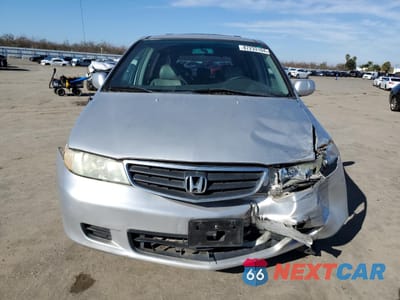 Piąte zdjęcie samochodu w środku: 2002 HONDA ODYSSEY EXL VIN:5FNRL18042B056553 - miniatura
