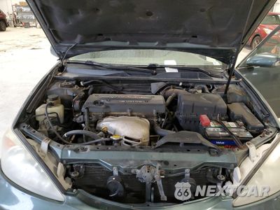 Zdjęcie 11 z 12 samochodu: 2003 TOYOTA CAMRY LE VIN:4T1BE32K83U182436 - miniatura
