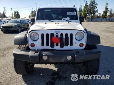 Piąte zdjęcie samochodu w środku: 2012 JEEP WRANGLER UNLIMITED SPORT VIN:1C4BJWDG2CL163171 - miniatura