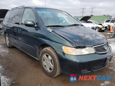 Czwarte zdjęcie samochodu z boku: 2000 HONDA ODYSSEY EX VIN:2HKRL1864YH533545 - miniatura