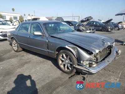 Czwarte zdjęcie samochodu z boku: 2002 JAGUAR XJR VIN:SAJDA15B12MF49401 - miniatura