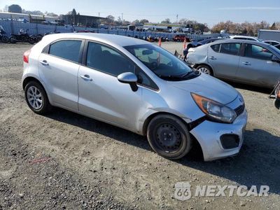 Czwarte zdjęcie samochodu z boku: 2013 KIA RIO LX VIN:KNADM5A34D6310177 - miniatura