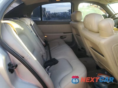 Zdjęcie 10 z 12 samochodu: 2002 BUICK PARK AVENUE VIN:1G4CW54K124236216 - miniatura
