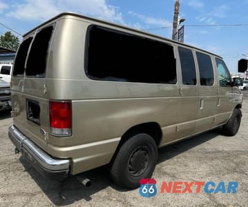 Czwarte zdjęcie samochodu z boku: 1999 FORD ECONOLINE E150 WAGON VIN:1FMRE11L6XHB70992 - miniatura