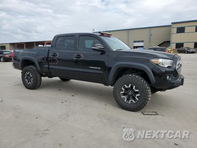 Czwarte zdjęcie samochodu z boku: 2016 TOYOTA TACOMA DOUBLE CAB VIN:5TFDZ5BN8GX006577 - miniatura