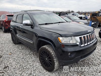 Czwarte zdjęcie samochodu z boku: 2013 JEEP GRAND CHEROKEE OVERLAND VIN:1C4RJFCG4DC600234 - miniatura