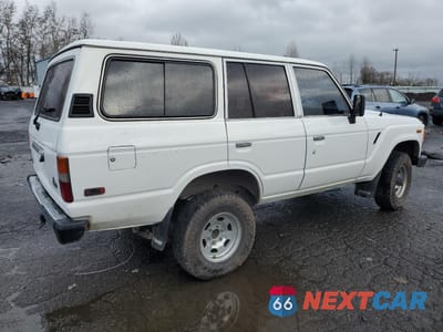 Trzecie zdjęcie samochodu z tyłu: 1987 TOYOTA LAND CRUISER FJ60 VIN:JT3FJ60G8H1138922 - miniatura