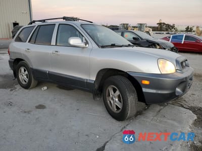 Czwarte zdjęcie samochodu z boku: 2003 HYUNDAI SANTA FE GLS VIN:KM8SC13D93U392375 - miniatura