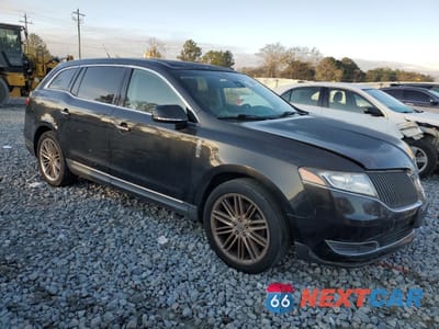 Czwarte zdjęcie samochodu z boku: 2015 LINCOLN MKT VIN:2LMHJ5AT7FBL03578 - miniatura