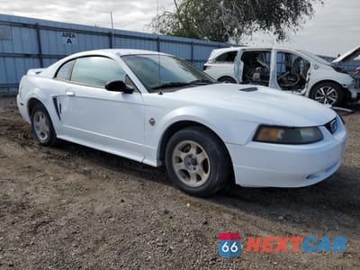 Czwarte zdjęcie samochodu z boku: 1999 FORD MUSTANG VIN:1FAFP4047XF215324 - miniatura