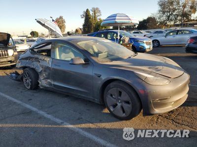 Czwarte zdjęcie samochodu z boku: 2023 TESLA MODEL 3 VIN:5YJ3E1EA8PF644539 - miniatura