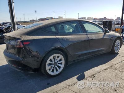 Trzecie zdjęcie samochodu z tyłu: 2023 TESLA MODEL 3 VIN:5YJ3E1EA0PF480980 - miniatura