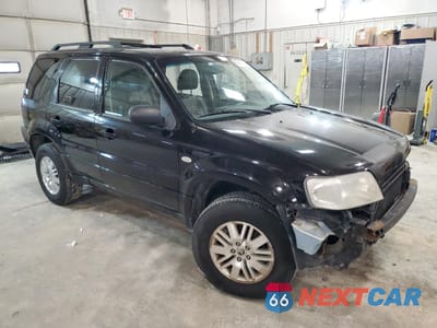 Czwarte zdjęcie samochodu z boku: 2005 MERCURY MARINER VIN:4M2YU56115DJ27306 - miniatura