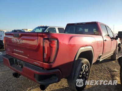 Czwarte zdjęcie samochodu z boku: 2022 GMC SIERRA K2500 AT4 VIN:1GT49PEY5NF353708 - miniatura