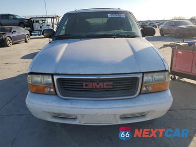 Piąte zdjęcie samochodu w środku: 1999 GMC JIMMY VIN:1GKCS13W5X2552867 - miniatura