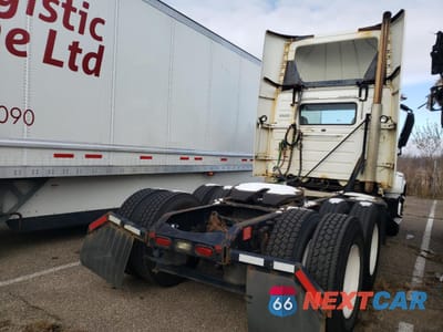 Czwarte zdjęcie samochodu z boku: 2014 VOLVO VN VNL VIN:4V4NC9EG1EN159308 - miniatura