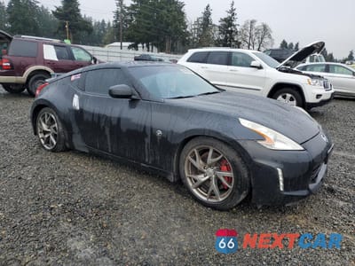 Czwarte zdjęcie samochodu z boku: 2014 NISSAN 370Z BASE VIN:JN1AZ4EH8EM632599 - miniatura