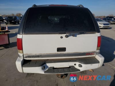 Zdjęcie 6 z 13 samochodu: 1999 GMC JIMMY VIN:1GKCS13W5X2552867 - miniatura