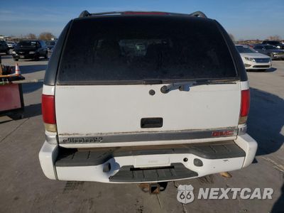 Zdjęcie 6 z 13 samochodu: 1999 GMC JIMMY VIN:1GKCS13W5X2552867 - miniatura