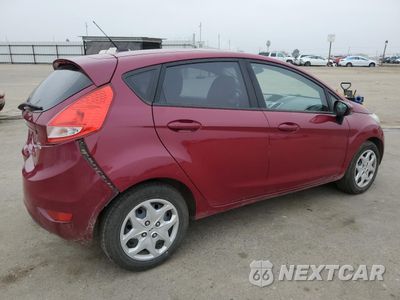 Trzecie zdjęcie samochodu z tyłu: 2011 FORD FIESTA SE VIN:3FADP4EJ4BM172883 - miniatura