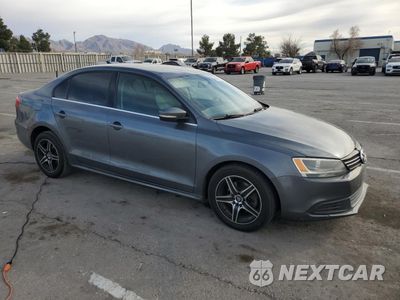 Czwarte zdjęcie samochodu z boku: 2014 VOLKSWAGEN JETTA SE VIN:3VWD17AJ0EM277604 - miniatura