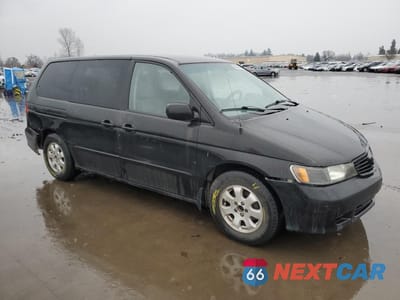 Czwarte zdjęcie samochodu z boku: 2000 HONDA ODYSSEY LX VIN:2HKRL1853YH580900 - miniatura