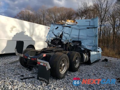 Czwarte zdjęcie samochodu z boku: 2016 VOLVO VN VNL VIN:4V4N99EHXGN967828 - miniatura