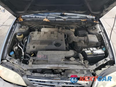 Zdjęcie 11 z 13 samochodu: 2003 KIA SPECTRA BASE VIN:KNAFB121835264507 - miniatura