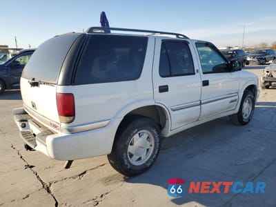 Trzecie zdjęcie samochodu z tyłu: 1999 GMC JIMMY VIN:1GKCS13W5X2552867 - miniatura