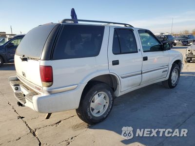 Trzecie zdjęcie samochodu z tyłu: 1999 GMC JIMMY VIN:1GKCS13W5X2552867 - miniatura
