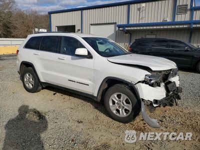 Czwarte zdjęcie samochodu z boku: 2017 JEEP GRAND CHEROKEE LAREDO VIN:1C4RJFAG1HC900001 - miniatura
