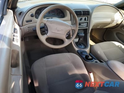 Zdjęcie 8 z 14 samochodu: 1999 FORD MUSTANG VIN:1FAFP4047XF215324 - miniatura