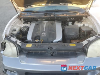 Zdjęcie 13 z 15 samochodu: 2005 HYUNDAI SANTA FE GLS VIN:KM8SC13E35U984673 - miniatura