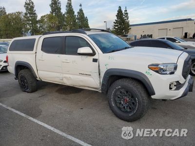 Czwarte zdjęcie samochodu z boku: 2016 TOYOTA TACOMA DOUBLE CAB VIN:3TMAZ5CN8GM009504 - miniatura