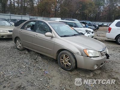Czwarte zdjęcie samochodu z boku: 2004 KIA SPECTRA LX VIN:KNAFE121045029608 - miniatura