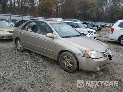 Czwarte zdjęcie samochodu z boku: 2004 KIA SPECTRA LX VIN:KNAFE121045029608 - miniatura