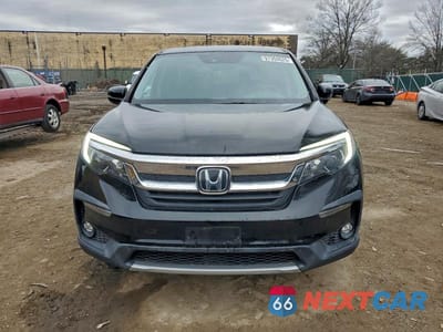 Piąte zdjęcie samochodu w środku: 2020 HONDA PILOT EXL VIN:5FNYF6H5XLB054903 - miniatura