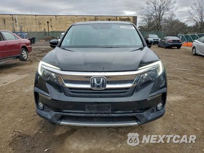 Piąte zdjęcie samochodu w środku: 2020 HONDA PILOT EXL VIN:5FNYF6H5XLB054903 - miniatura