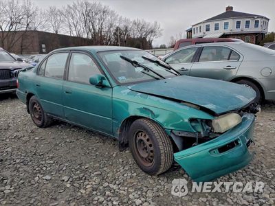 Czwarte zdjęcie samochodu z boku: 1997 TOYOTA COROLLA DX VIN:2T1BB02E4VC180091 - miniatura