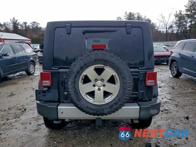 Zdjęcie 6 z 12 samochodu: 2011 JEEP WRANGLER UNLIMITED SAHARA VIN:1J4BA5H13BL603682 - miniatura