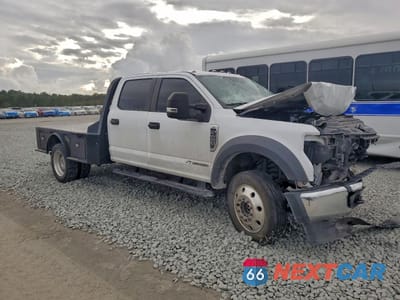 Czwarte zdjęcie samochodu z boku: 2022 FORD F450 FLATBED TRUCK VIN:1FT8W4DT1NEE75597 - miniatura