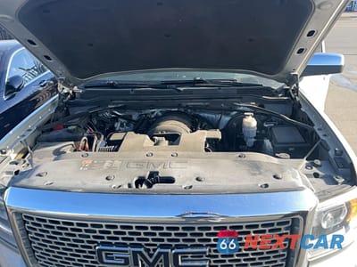 Zdjęcie 7 z 10 samochodu: 2014 GMC SIERRA K1500 DENALI VIN:3GTU2WEC6EG497446 - miniatura