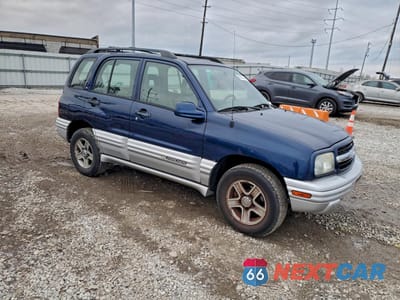 Czwarte zdjęcie samochodu z boku: 2002 CHEVROLET TRACKER LT VIN:2CNBE634626944015 - miniatura